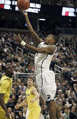 Tim Hardaway Jr. (10) and Zack Novak (0)