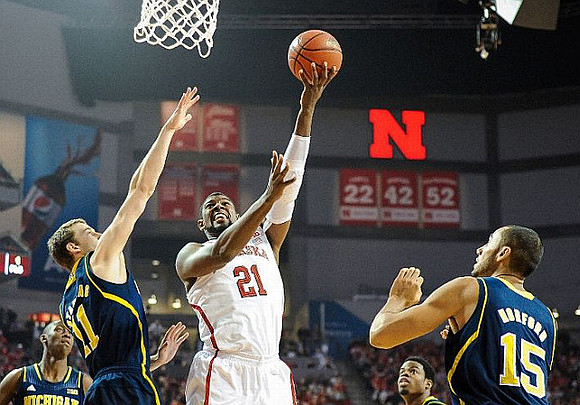 Caris LeVert (23), Nik Stauskas (11), Derrick Walton Jr. (10), and Jon Horford (15)