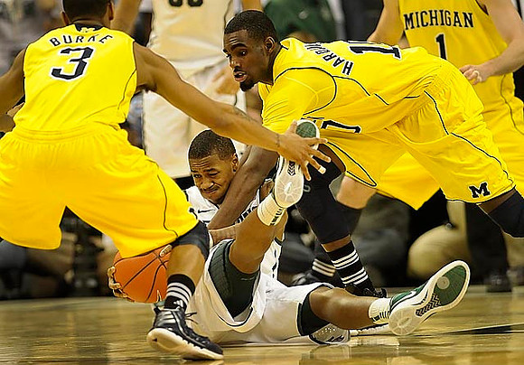 Trey Burke (3), Tim Hardaway Jr. (10), and Stu Douglass (1)