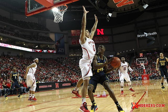 Caris LeVert (23) and Jordan Morgan (52)