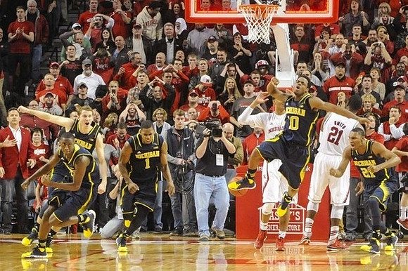 Caris LeVert (23), Nik Stauskas (11), Glenn Robinson III (1), Derrick Walton Jr. (10), and Zak Irvin (21)