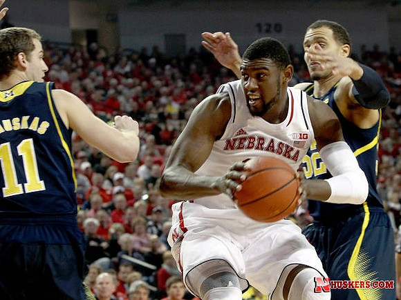 Nik Stauskas (11) and Jordan Morgan (52)
