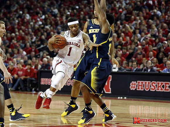 Nik Stauskas (11), Jon Horford (15), and Derrick Walton Jr. (10)