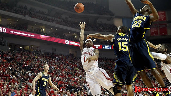 Nik Stauskas (11), Jon Horford (15), and Caris LeVert (23)