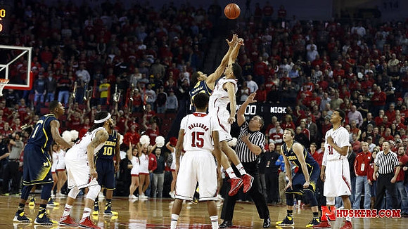 Glenn Robinson III (1), Derrick Walton Jr. (10), and Nik Stauskas (11)