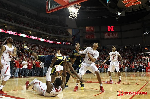 Derrick Walton Jr. (10) and Glenn Robinson III (1)