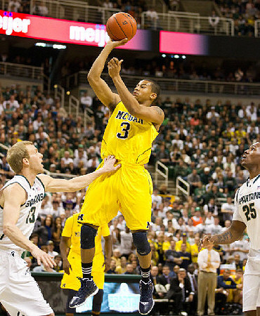 Trey Burke (3) and Tim Hardaway Jr. (10)