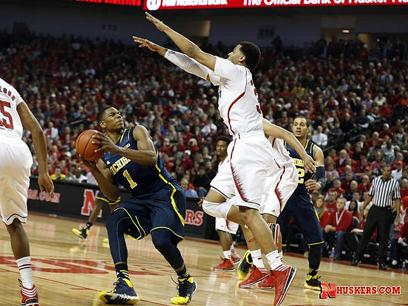 Glenn Robinson III (1) and Jordan Morgan (52)