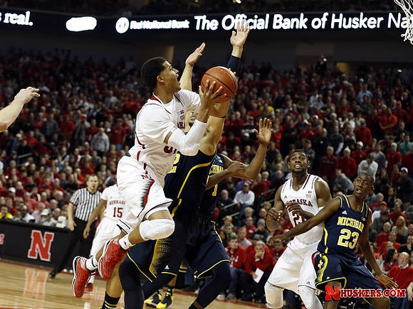 Jordan Morgan (52), Glenn Robinson III (1), and Caris LeVert (23)