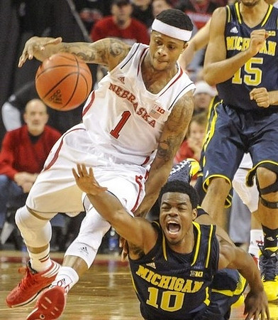 Derrick Walton Jr. (10) and Jon Horford (15)