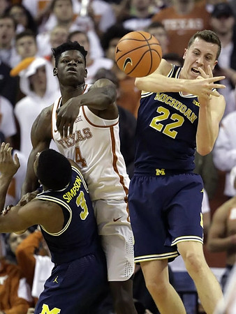 Zavier Simpson (3) and Duncan Robinson (22)