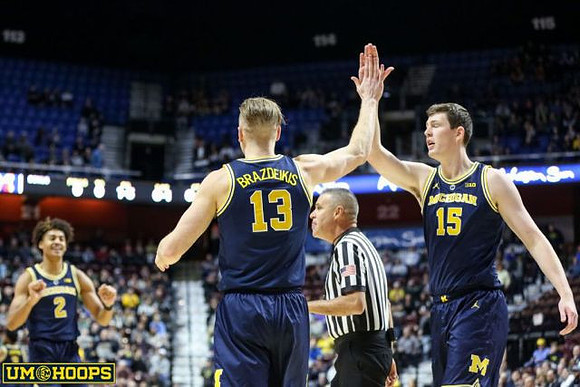 Jordan Poole (2), Ignas Brazdeikis (13), and Jon Teske (15)