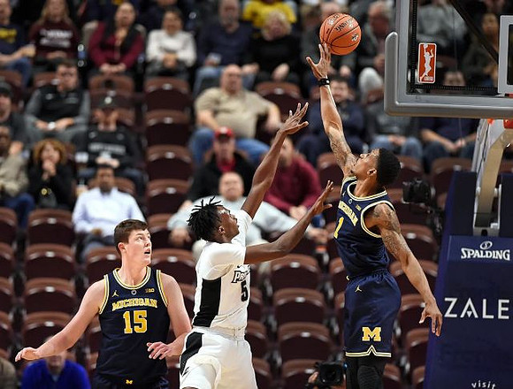 Jon Teske (15) and Charles Matthews (1)