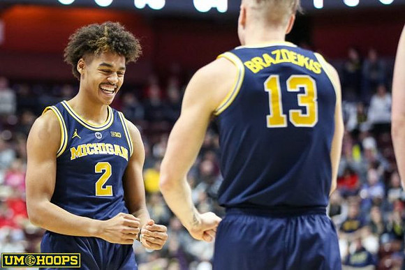 Jordan Poole (2) and Ignas Brazdeikis (13)