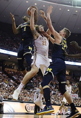 Charles Matthews (1) and Moritz Wagner (13)