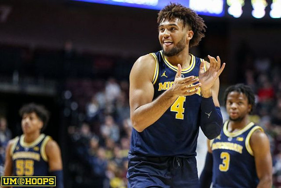 Eli Brooks (55), Isaiah Livers (4), and Zavier Simpson (3)
