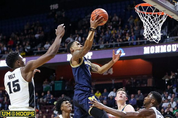 Charles Matthews (1) and Jon Teske (15)