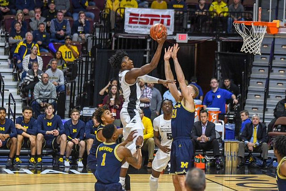 Charles Matthews (1), Jordan Poole (2), and Ignas Brazdeikis (13)