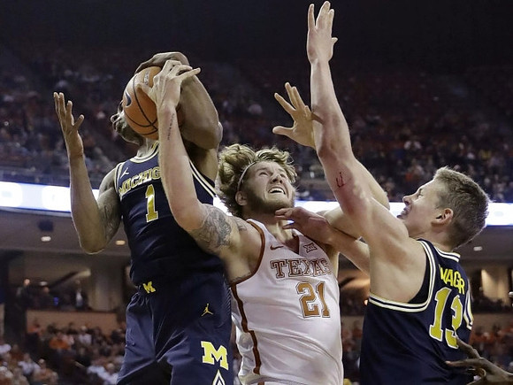 Charles Matthews (1) and Moritz Wagner (13)