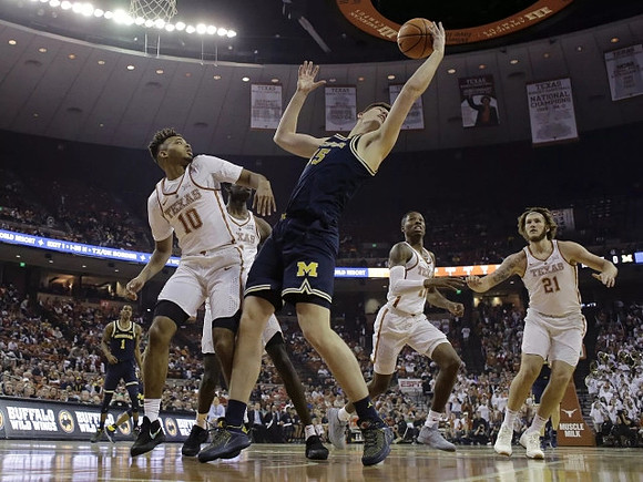 Jon Teske (15) and Charles Matthews (1)