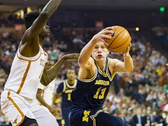 Charles Matthews (1) and Moritz Wagner (13)