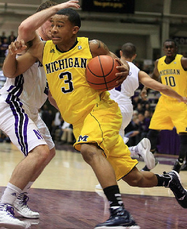 Trey Burke (3) and Tim Hardaway Jr. (10)