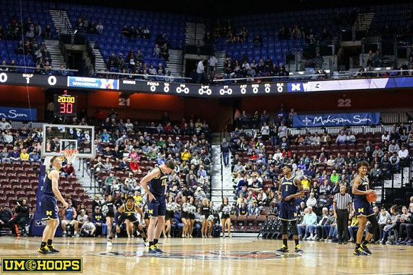 Ignas Brazdeikis (13), Jon Teske (15), Charles Matthews (1), and Jordan Poole (2)