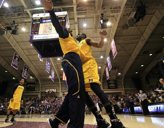Trey Burke (3), Corey Person (32), and Tim Hardaway Jr. (10)