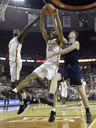 Jon Teske (15) and Charles Matthews (1)