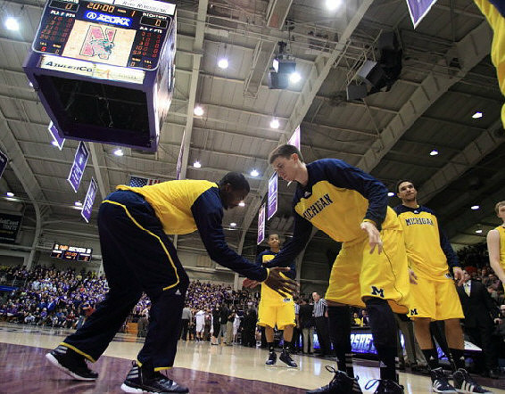 Corey Person (32), Stu Douglass (1), Trey Burke (3), and Colton Christian (45)
