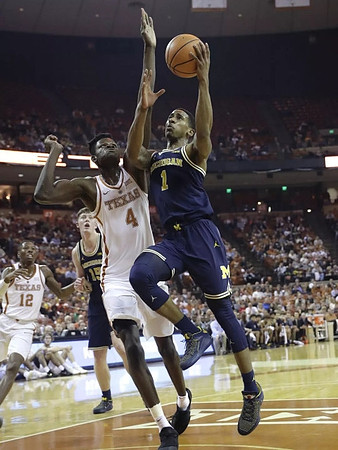 Jon Teske (15) and Charles Matthews (1)