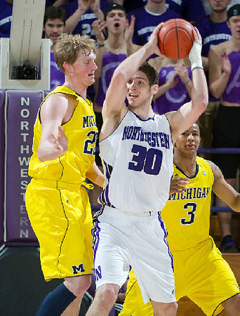 Blake McLimans (22) and Trey Burke (3)