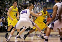 Zack Novak (0) and Trey Burke (3)