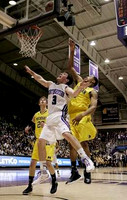 Evan Smotrycz (23) and Trey Burke (3)