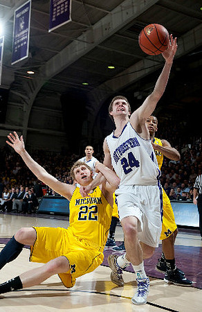Blake McLimans (22) and Trey Burke (3)