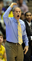 Zack Novak (0), John Beilein, and LaVall Jordan