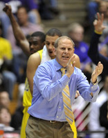 Tim Hardaway Jr. (10), Jordan Morgan (52), and John Beilein