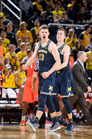 Moritz Wagner (13) and Duncan Robinson (22)