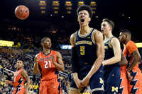 D.J. Wilson (5) and Mark Donnal (34)