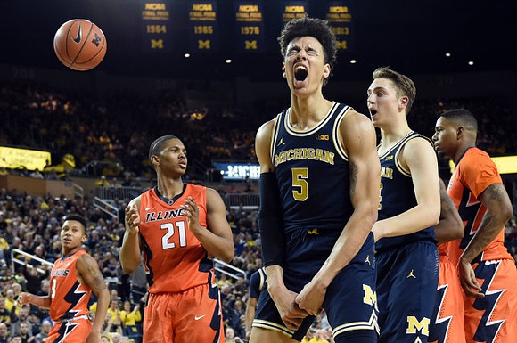D.J. Wilson (5) and Mark Donnal (34)