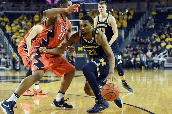 Zak Irvin (21) and Moritz Wagner (13)