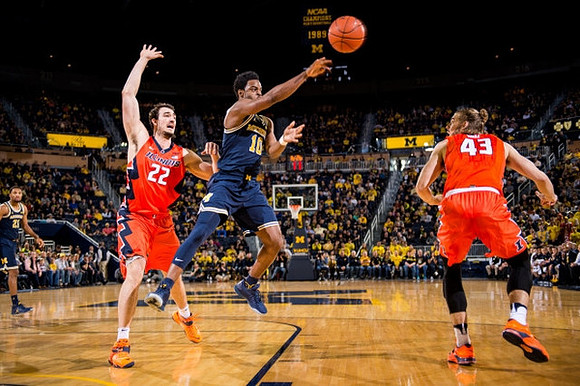 Derrick Walton Jr. (10) and Zak Irvin (21)