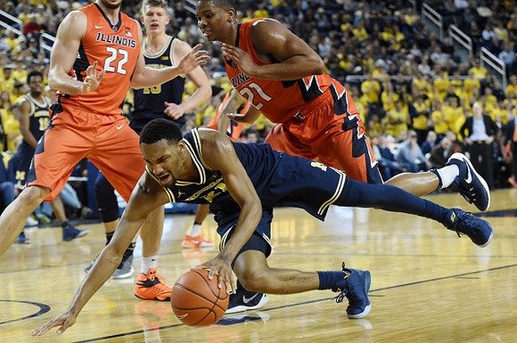 Zak Irvin (21) and Moritz Wagner (13)