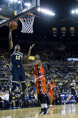 Muhammad-Ali Abdur-Rahkman (12) and D.J. Wilson (5)