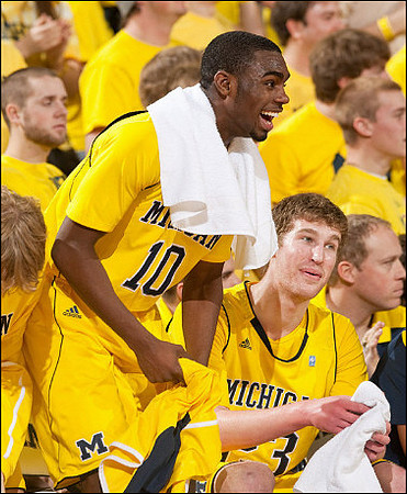Tim Hardaway Jr. (10) and Evan Smotrycz (23)