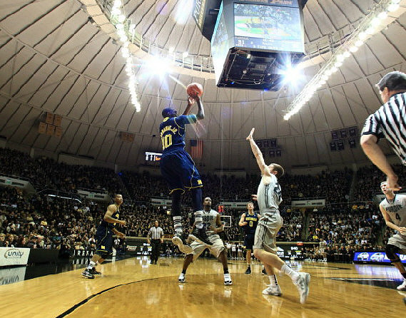 Trey Burke (3), Tim Hardaway Jr. (10), and Zack Novak (0)