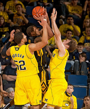 Jordan Morgan (52) and Zack Novak (0)