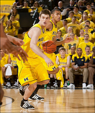 Stu Douglass (1) and Jon Horford (15)