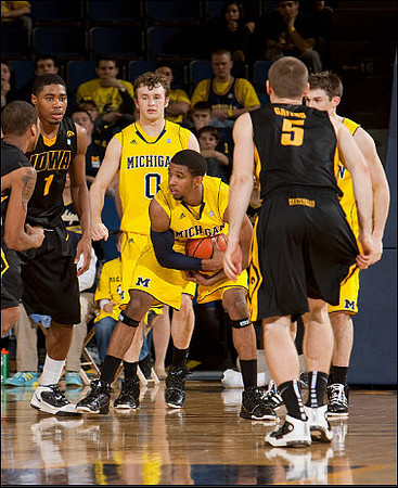 Darius Morris (4), Zack Novak (0), and Stu Douglass (1)