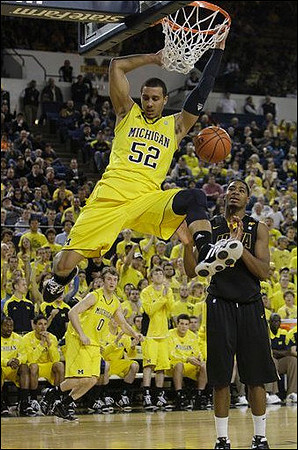 Jordan Morgan (52) and Zack Novak (0)